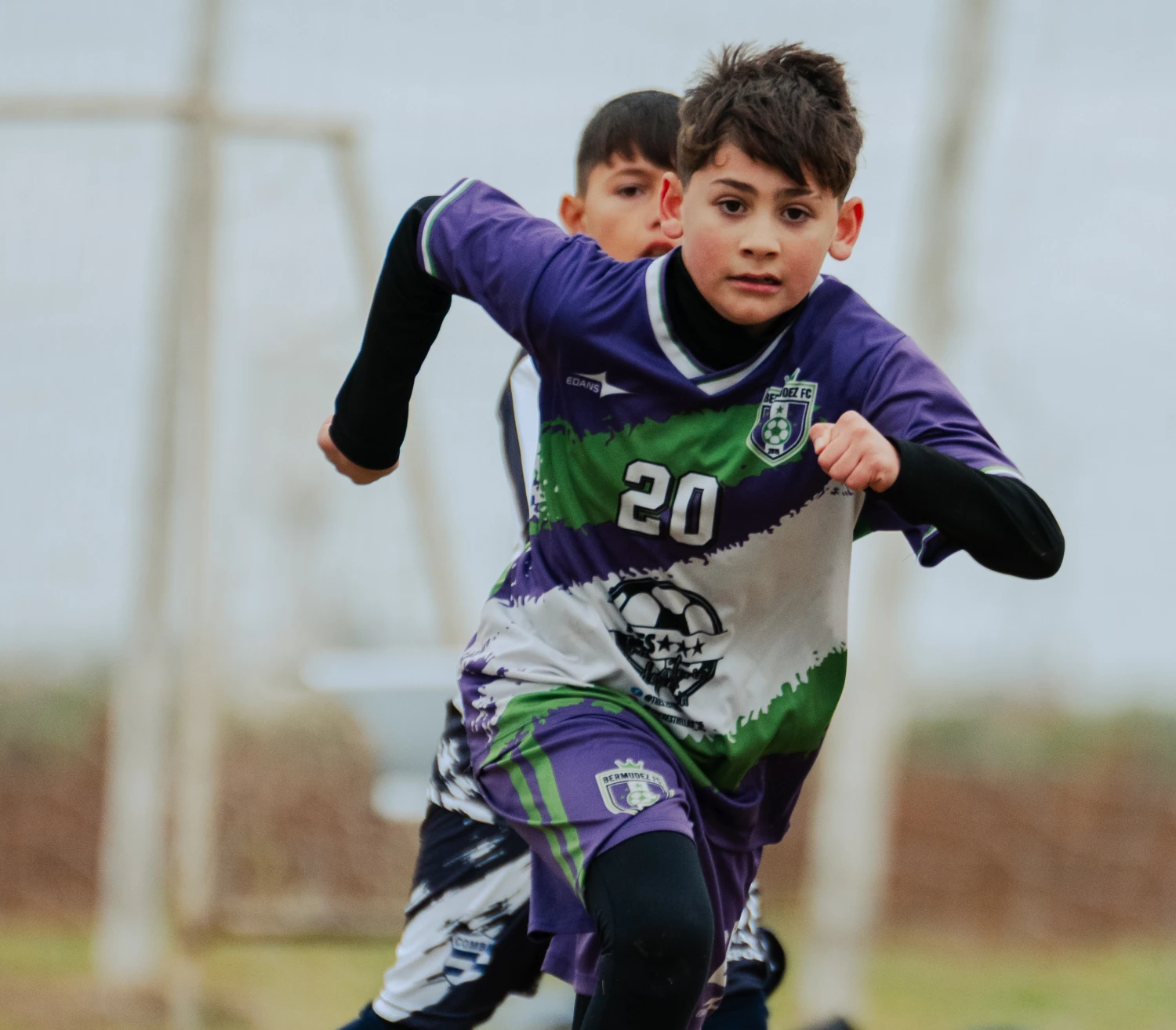 Oliver races forward during the match.